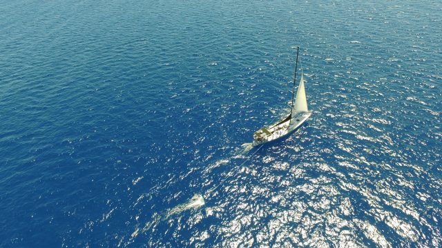 Mega Expedition research vessel deploying manta trawl.
