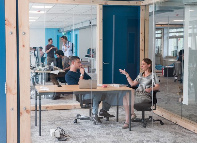 Lonneke Holierhoek (COO) discusses with Francesco Ferrari (Environmental Monitoring Coordinator) at The Ocean Cleanup Headquarters in Rotterdam, June 2018.