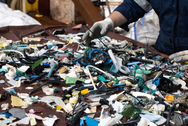 Macroplastics being sorted on board the support vessel of the System 002 mission, in January 2022