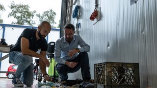 Matthias Egger, Ocean Plastic Researcher at The Ocean Cleanup, analyzing plastic items to find clues on their origin based on language and country codes. This research was done in collaboration with Wageningen University.