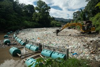 Excavators removing trash from the Interceptor Barricade in Guatemala, Rio Las Vacas (July 2023)