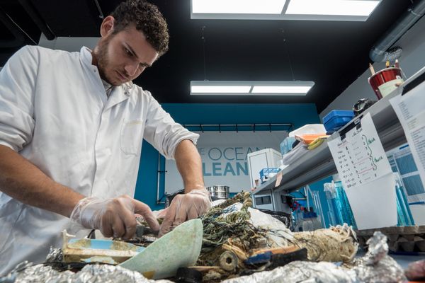 The Ocean Cleanup research team processes ocean plastic samples in the laboratory.