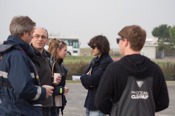 Members of the Adessium Foundation visiting The Ocean Cleanup crew at an early prototype test