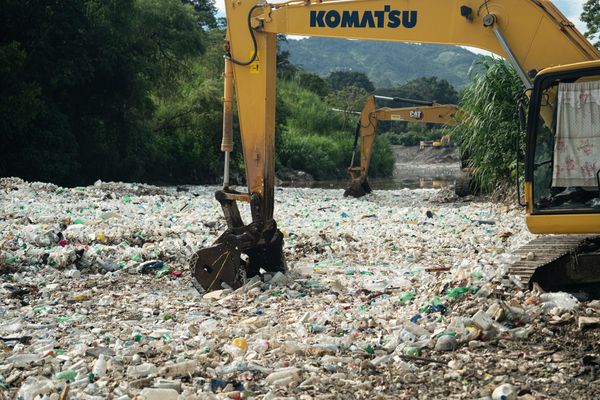 Excavators removing trash from the Interceptor Barricade in Guatemala, Rio Las Vacas (July 2023)