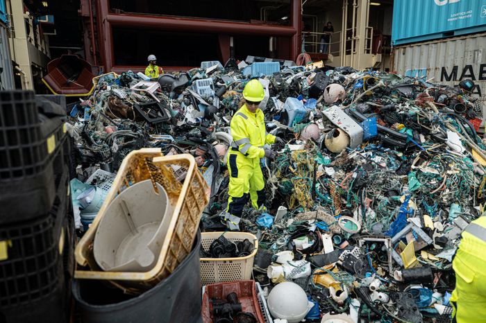 Crew sorting plastic on deck after System 002 extraction, October 2021