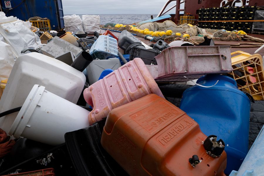 Plastic extraction from System 002, The Ocean Cleanup’s ocean system cleaning the Great Pacific Garbage Patch. Many crates and buoys originating from fishing activities can be seen in the catch.