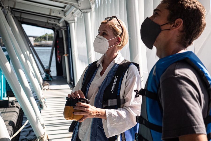 Inka Mattila, Resident Representative UNDP Dominican Republic visiting The Ocean Cleanup's Interceptor 004 in Dominican Republic