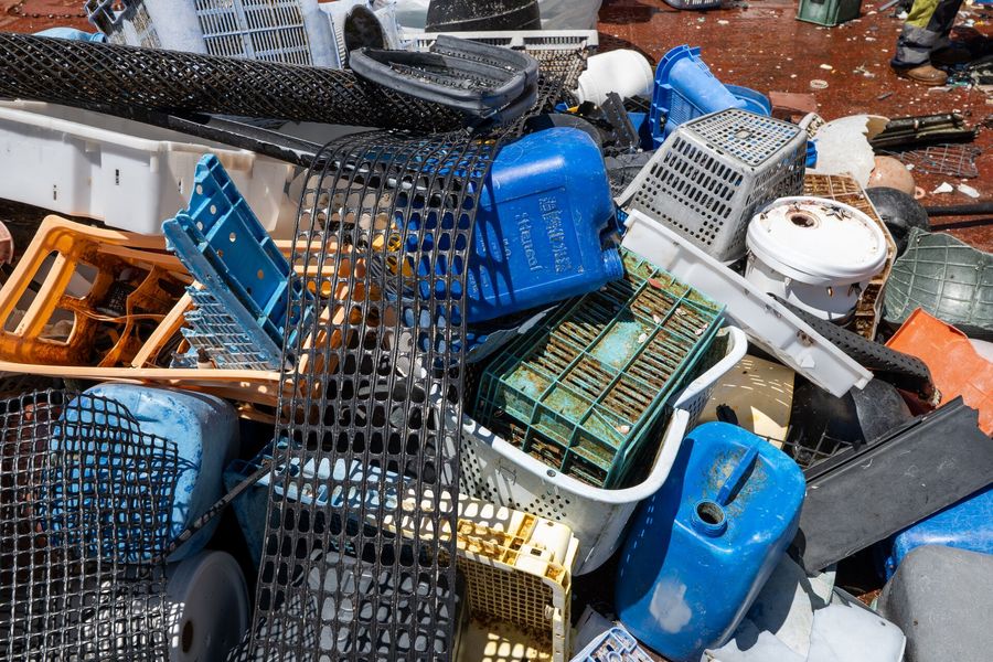 Picture of crates, jerry cans etc found during the System 002 cleanup mission