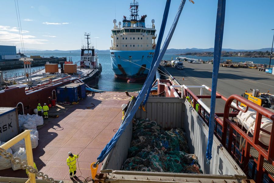 Sorted plastic from the catch being lifted on shore