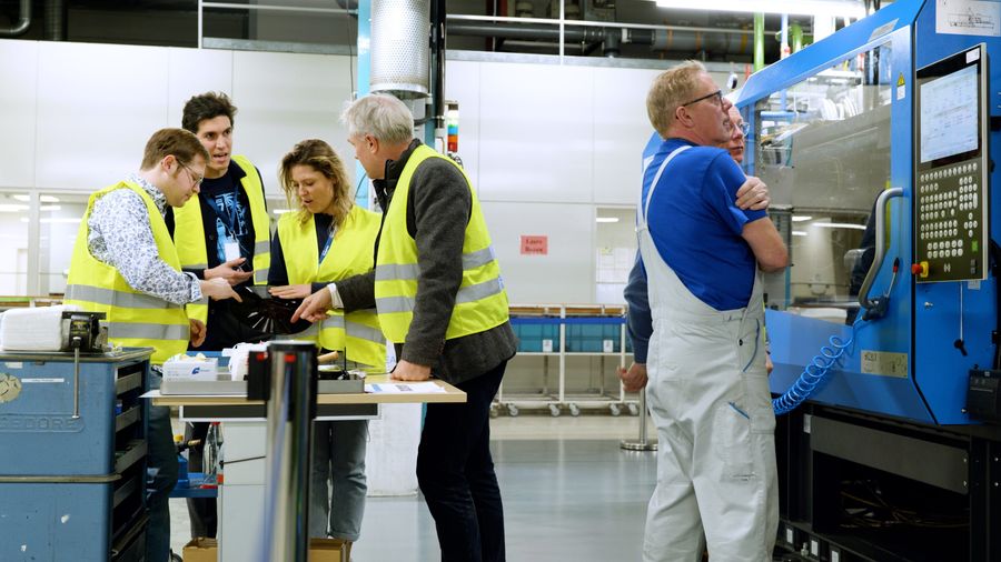 The Ocean Cleanup crew members visiting the Sonopress' facilities to see the production of LP samples